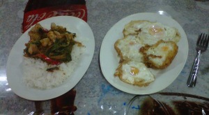Postworkout meal of eggs, meat and rice in Chiang Mai, Thailand