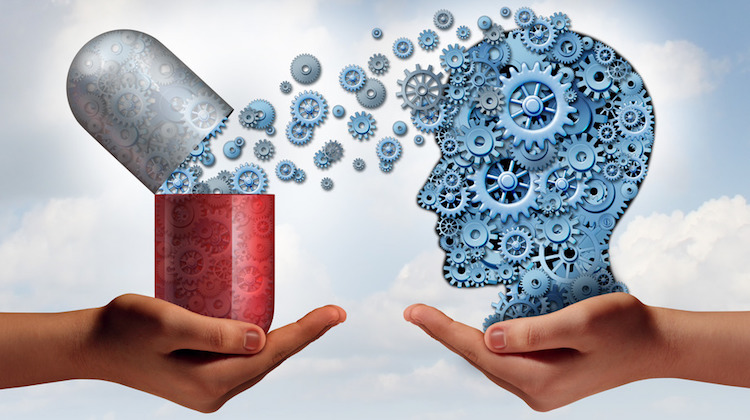 A pill connecting gears to a human brain made of gears to represent getting smarter with modafinil