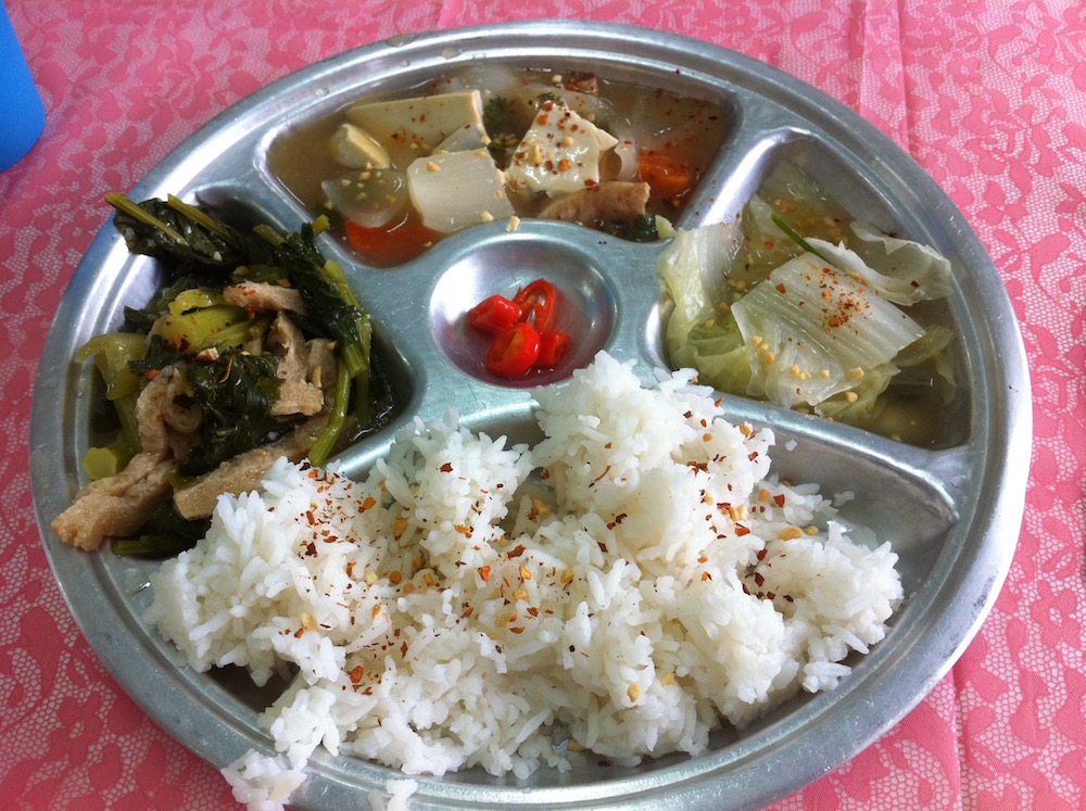 Rice and vegetables for lunch vipassana at a silent meditation retreat at Doi Suthep Buddhist temple in Chiang Mai, Thailand