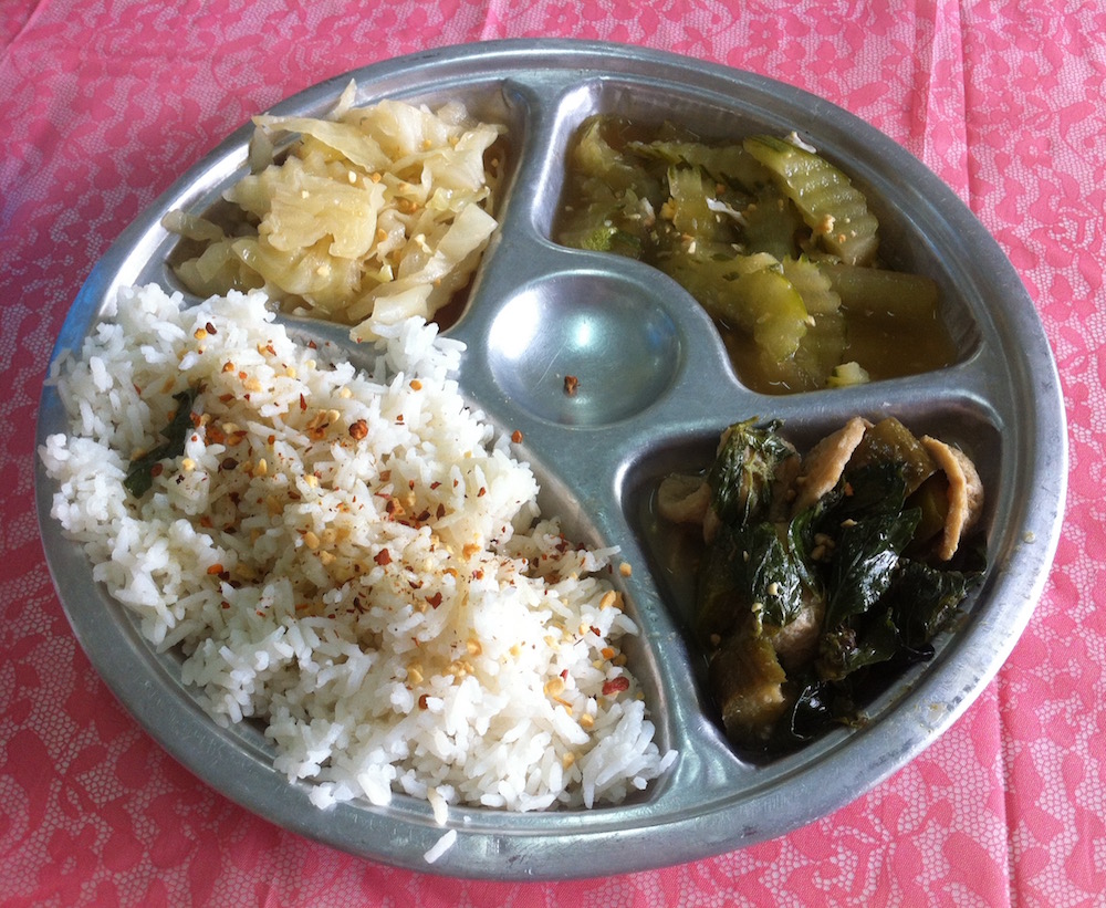 Rice and vegetables meal at the vipassana silent meditation retreat at Doi Suthep Buddhist temple in Chiang Mai, Thailand