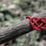 Red rope tied in a knot looking a little like a heart