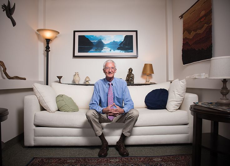Dr. Roland R. Griffiths sitting on the couch in a psychedelic therapy research session room at Johns Hopkins University